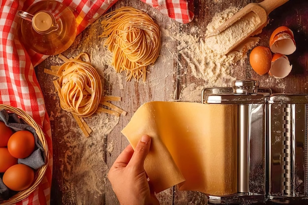 Hands preparing fresh pasta